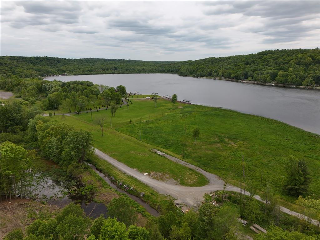55 Elm St Extension Stoneboro, PA 16153 - Photo 5 of 44 a view of a lake with a city