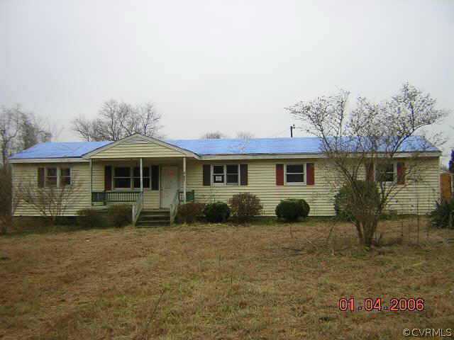 887 Devils Bottom Road Lancaster, VA 22503 - Photo 1 of 1 a front view of a house with a yard
