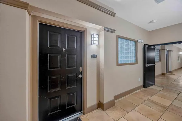 a view of hallway with a elevator