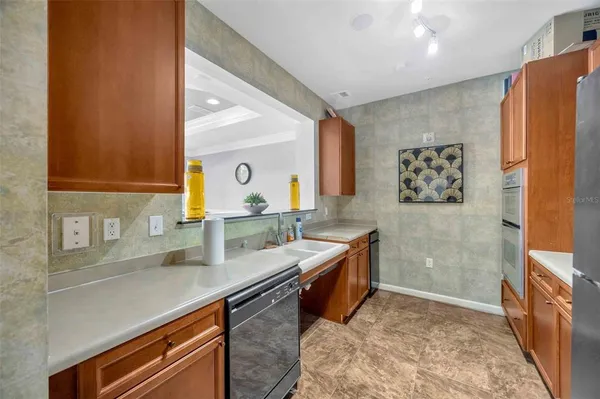 a bathroom with double vanity sink and a mirror