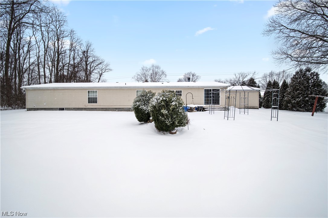 4951 Lane Road Perry, OH 44081 - Photo 27 of 31 View of snow covered house