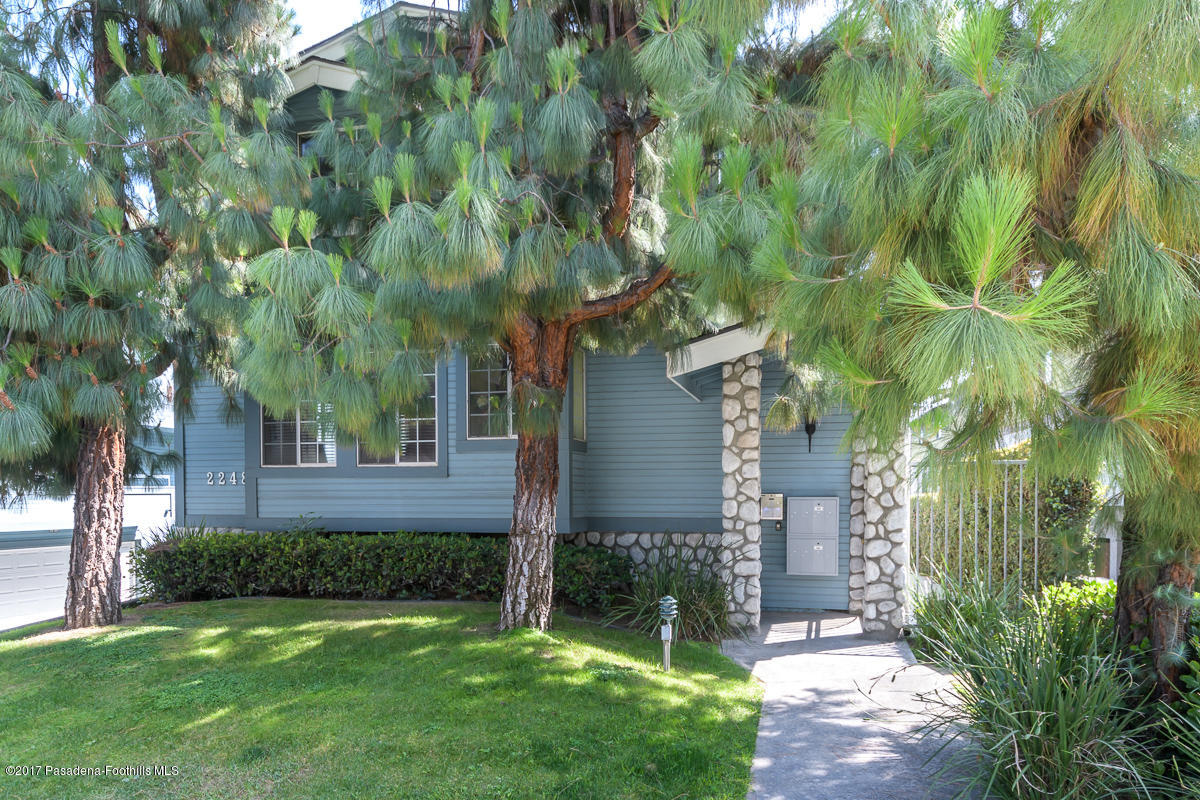 2248 Del Mar Road, Unit 7 Montrose, CA 91020 - Photo 1 of 35 a view of a house with a tree in front of it