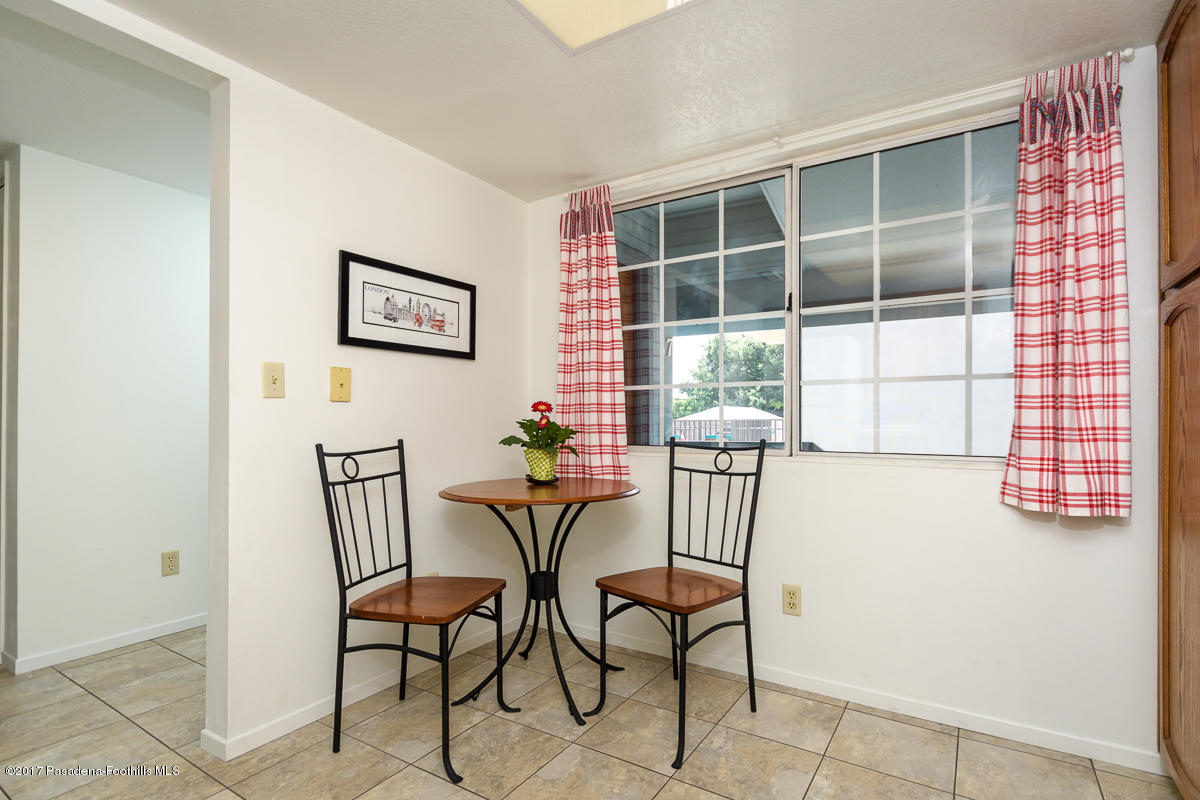 2248 Del Mar Road, Unit 7 Montrose, CA 91020 - Photo 15 of 35 a view of a dining room with furniture and window