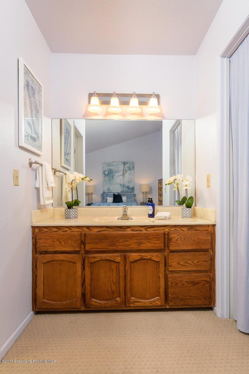 2248 Del Mar Road, Unit 7 Montrose, CA 91020 - Photo 28 of 35 a spacious bathroom with a double vanity sink and a mirror
