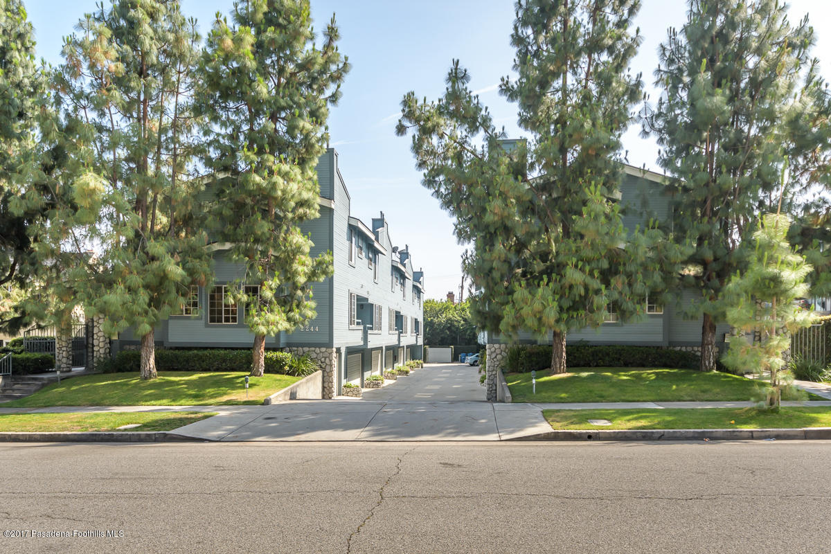 2248 Del Mar Road, Unit 7 Montrose, CA 91020 - Photo 35 of 35 a view of a house with a yard and large trees