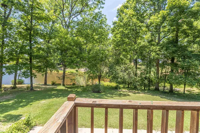 a view of backyard with green space