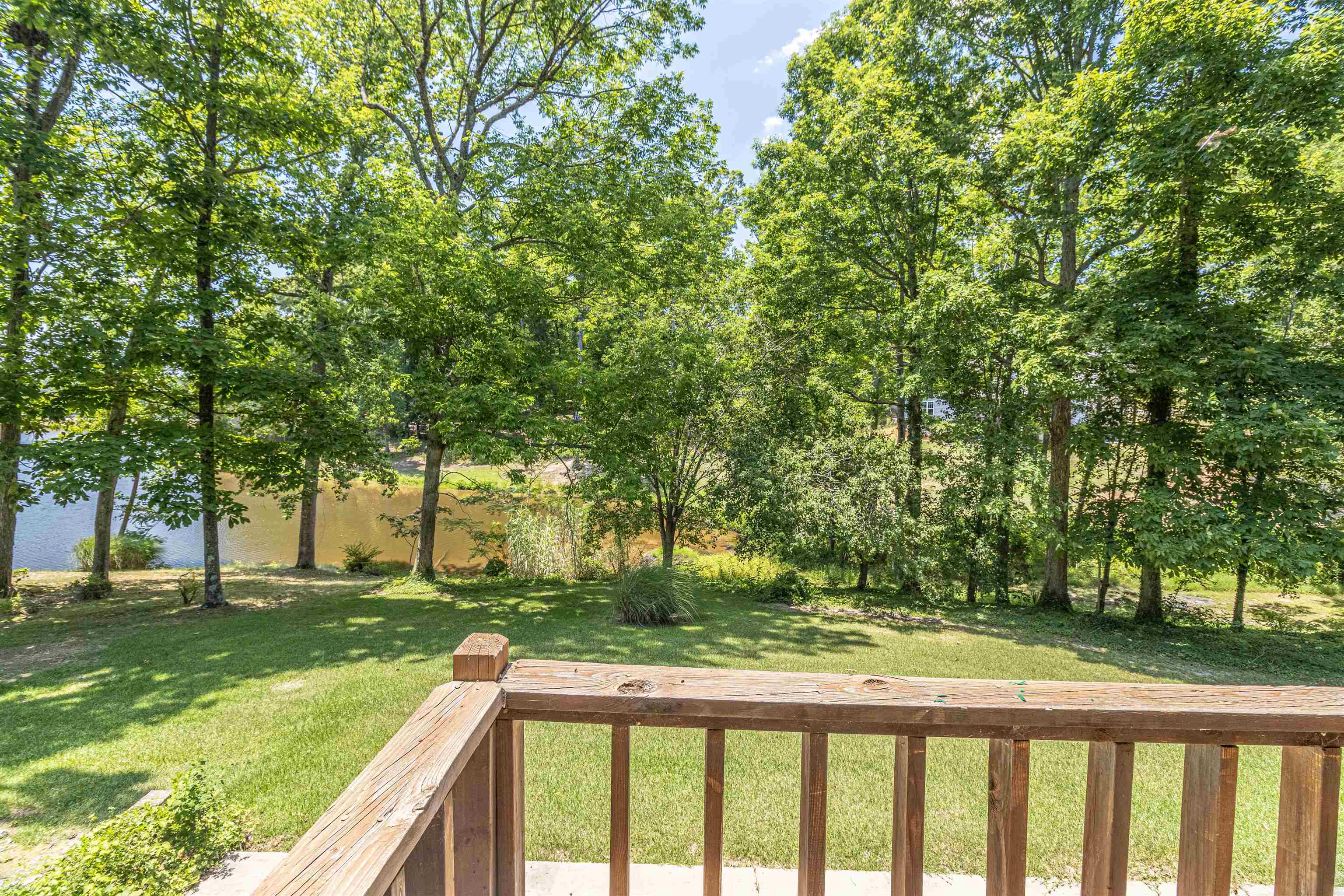 651 Pine Street Adamsville, TN 38310 - Photo 3 of 25 a view of backyard with green space