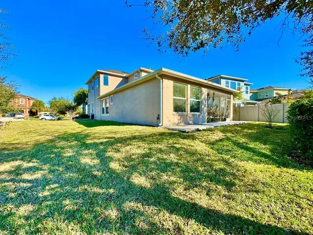 a view of a house with a big yard