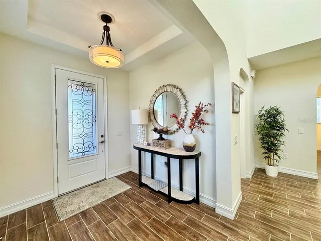 a view of a hallway view with staircase