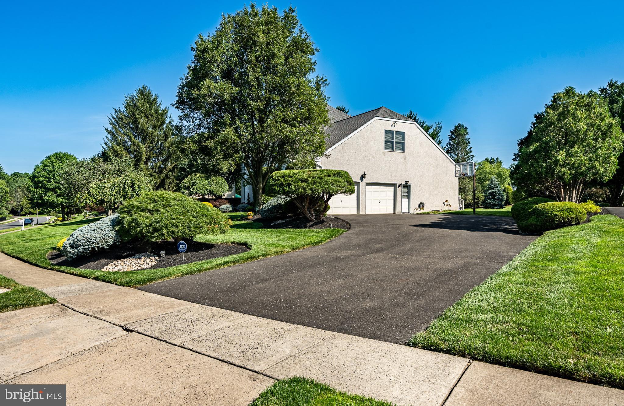 1716 St Georges Road Dresher, PA 19025 - Photo 3 of 90 Charming home with lush landscaping and driveway.