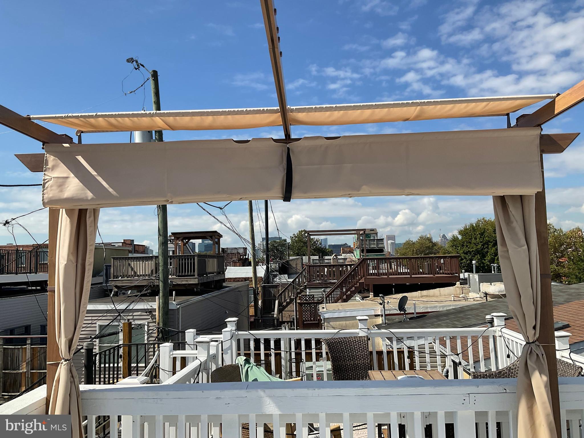 2437 Fleet Street Baltimore, MD 21224 - Photo 30 of 33 a room with lots of wooden furniture and shower