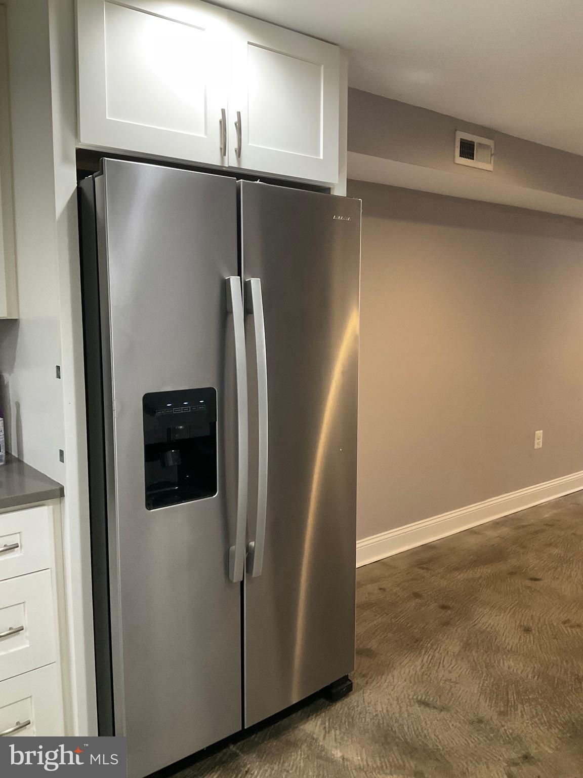 2437 Fleet Street Baltimore, MD 21224 - Photo 9 of 33 a view of a refrigerator in kitchen