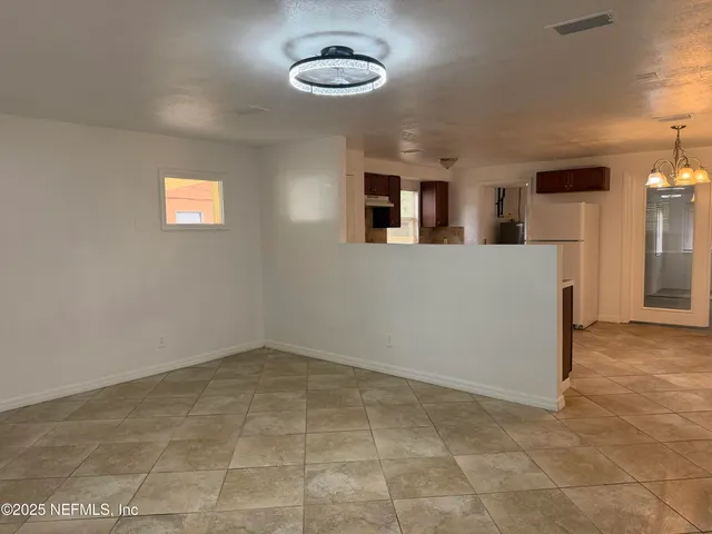 a view of a livingroom with furniture