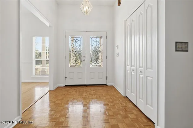 a view of an empty room with a window