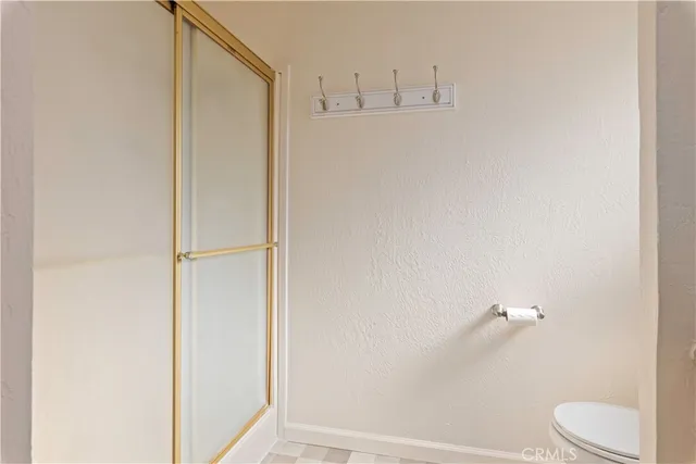 a view of balcony with wooden floor and outdoor seating