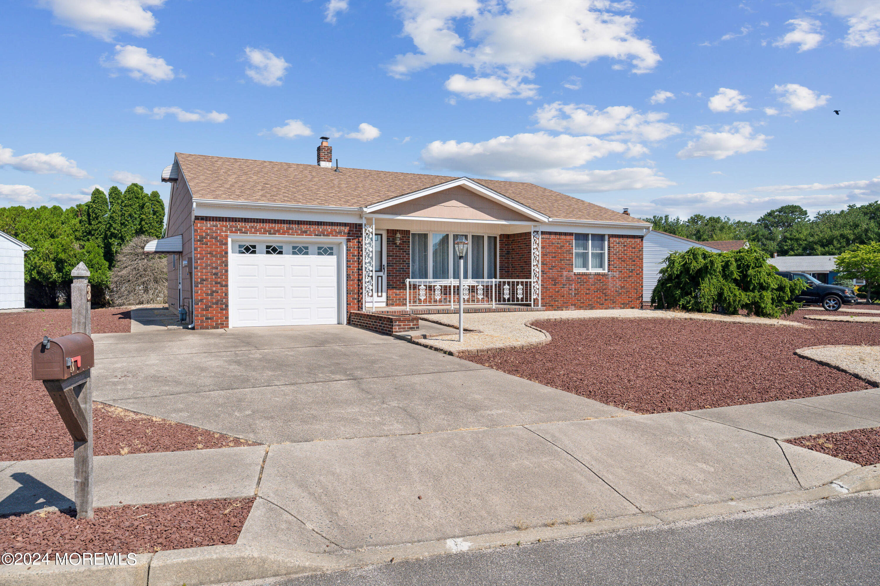 3 Garrett Road Toms River, NJ 08757 - Photo 1 of 24 a front view of a house with a yard