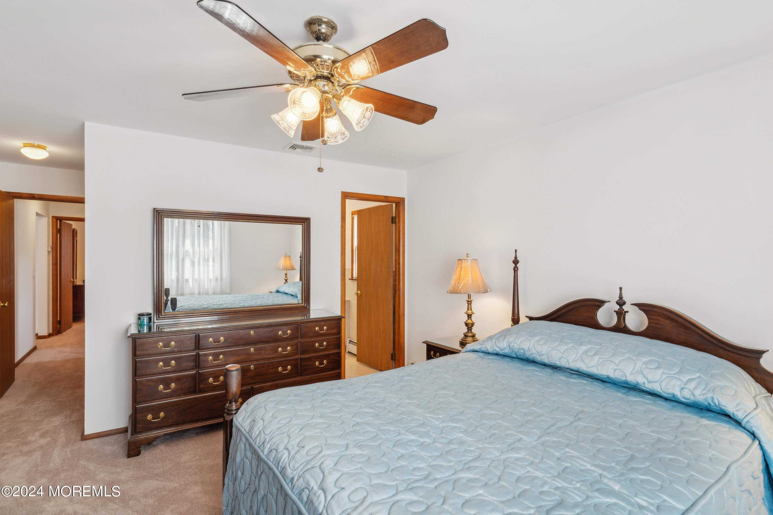 3 Garrett Road Toms River, NJ 08757 - Photo 17 of 24 a bedroom with a bed and a dresser