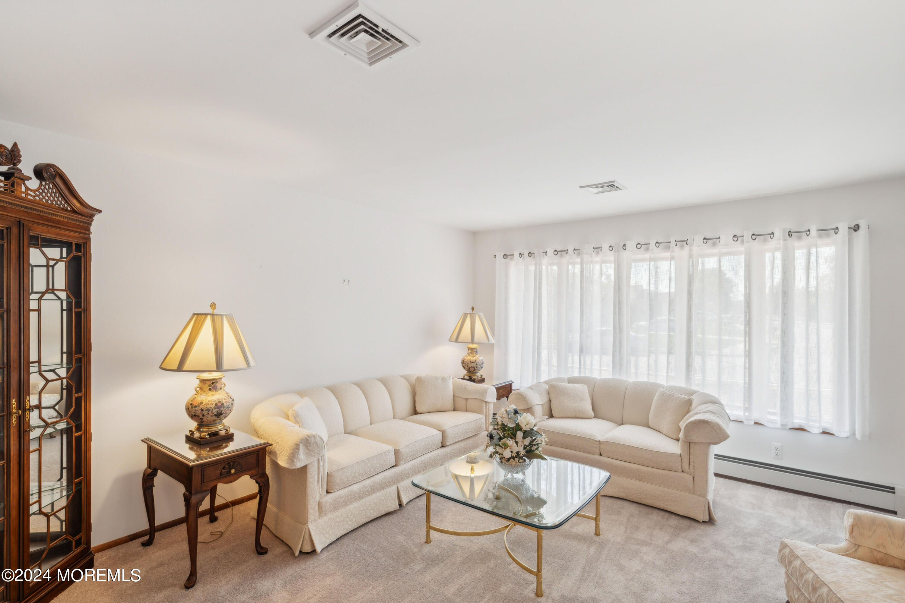 3 Garrett Road Toms River, NJ 08757 - Photo 4 of 24 a living room with furniture and a window