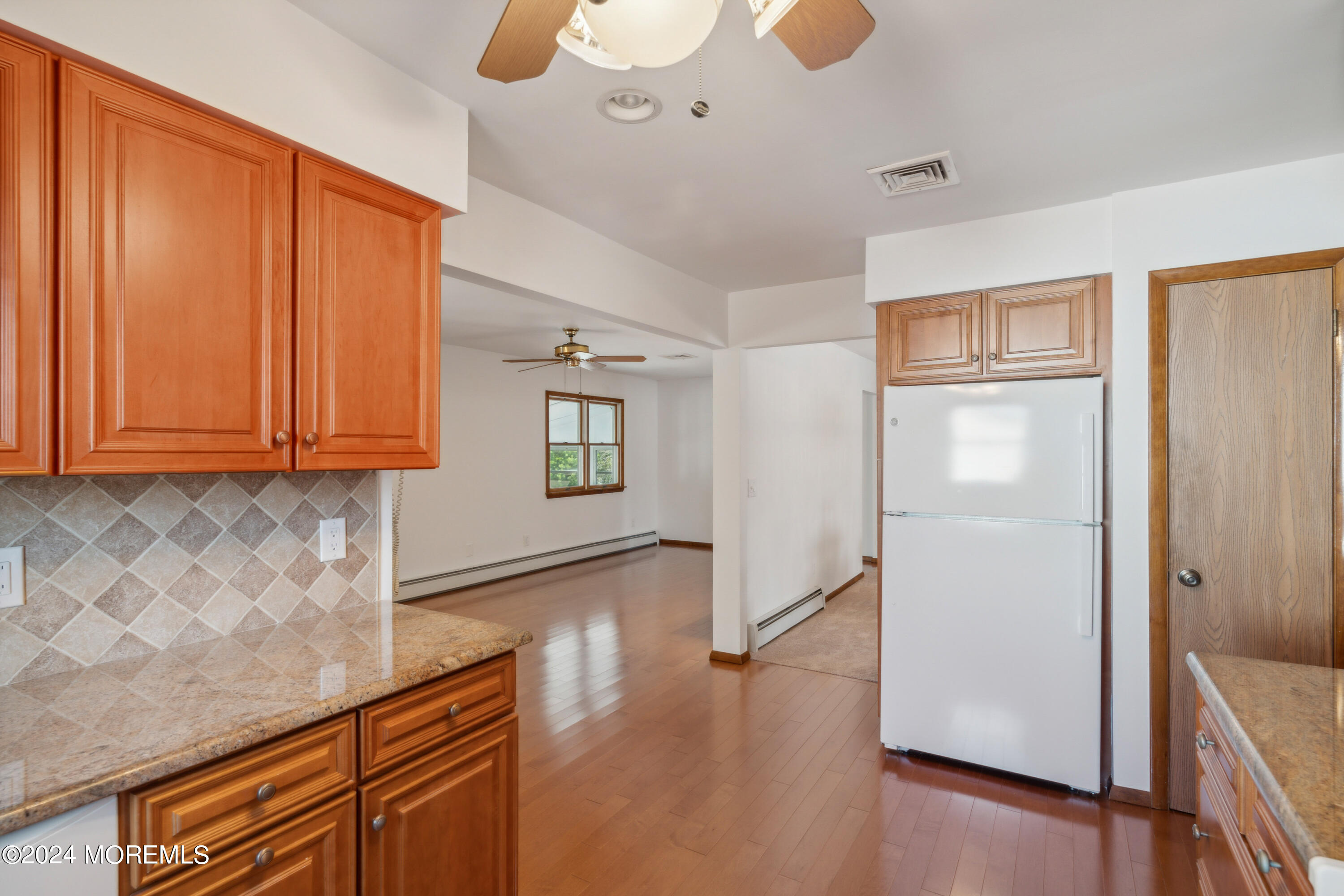 3 Garrett Road Toms River, NJ 08757 - Photo 10 of 24 an entryway with wooden floor