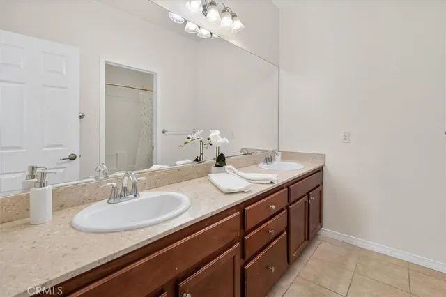 a bathroom with a shower a toilet and a shower