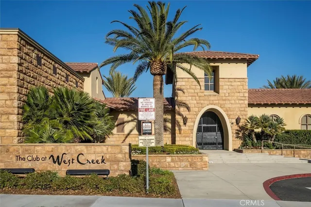 a view of a lake with a house in the background