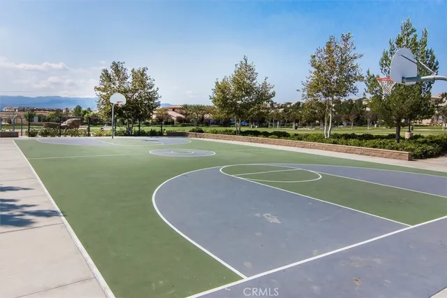 an aerial view of residential houses with outdoor space and river