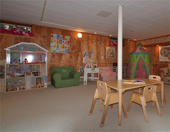 67 Brook Street Wellesley, MA 02482 - Photo 12 of 14 a room with lots of chairs and appliances