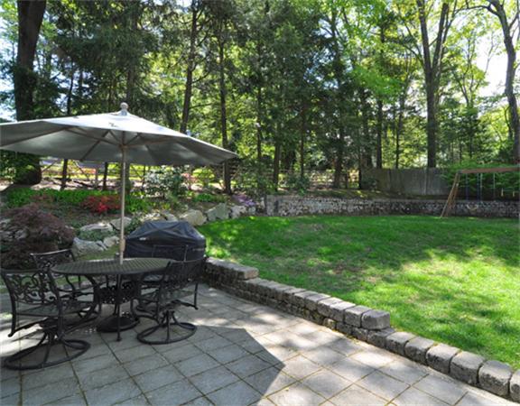 67 Brook Street Wellesley, MA 02482 - Photo 14 of 14 a view of backyard with outdoor seating and trees