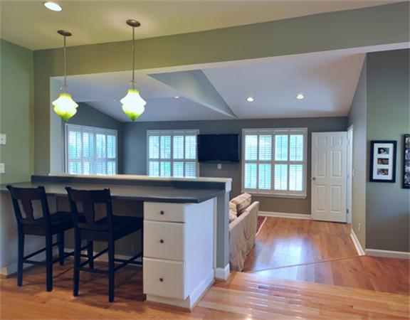 67 Brook Street Wellesley, MA 02482 - Photo 4 of 14 a open kitchen with a wooden floor dining table and chairs