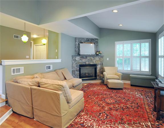 67 Brook Street Wellesley, MA 02482 - Photo 5 of 14 a living room with furniture and a fireplace