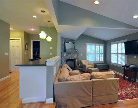 67 Brook Street Wellesley, MA 02482 - Photo 6 of 14 a living room with fireplace furniture and a wooden floor