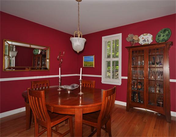 67 Brook Street Wellesley, MA 02482 - Photo 7 of 14 a view of a dining room with furniture wooden floor and chandelier