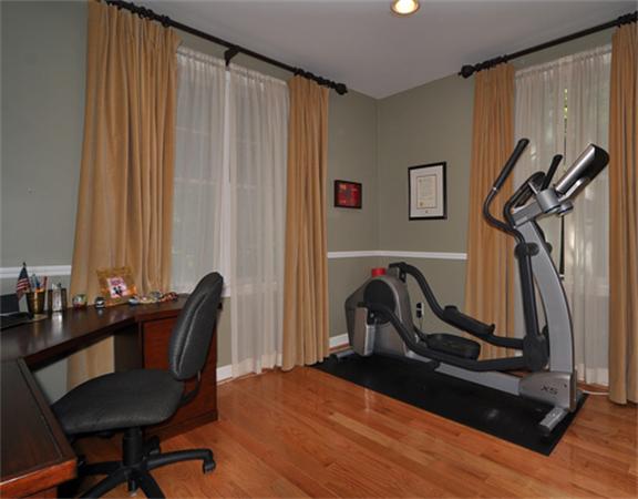 67 Brook Street Wellesley, MA 02482 - Photo 8 of 14 a view of a workspace with furniture and a window