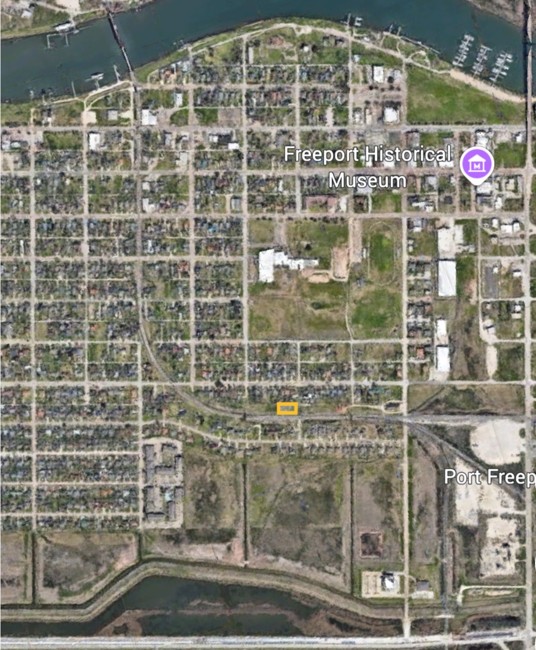 0 Ash Street Freeport, TX 77541 - Photo 8 of 9 a view of a city with tall buildings
