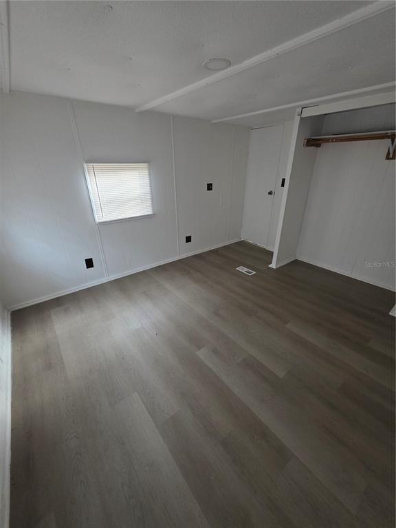 204 Johntry Road Hawthorne, FL 32640 - Photo 16 of 16 a view of an empty room and wooden floor