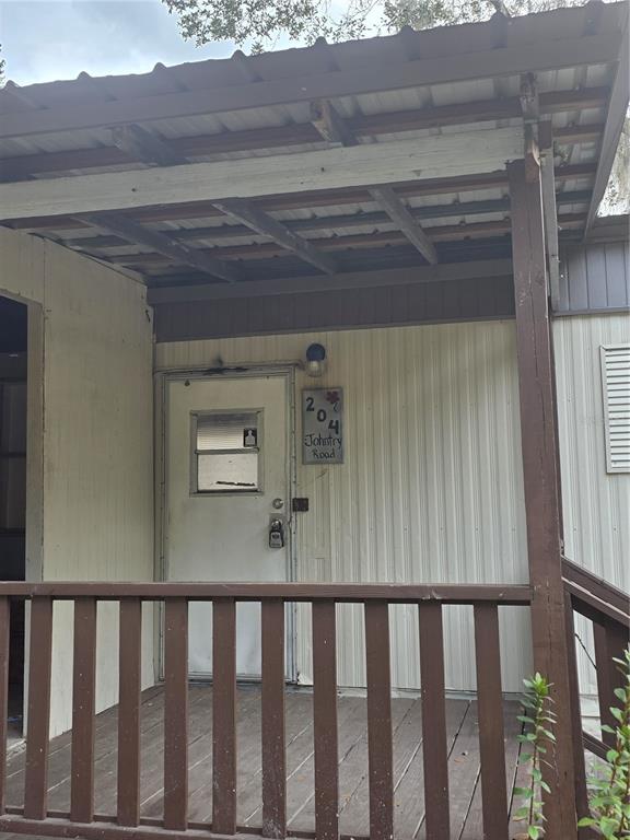 204 Johntry Road Hawthorne, FL 32640 - Photo 5 of 16 a view of a porch