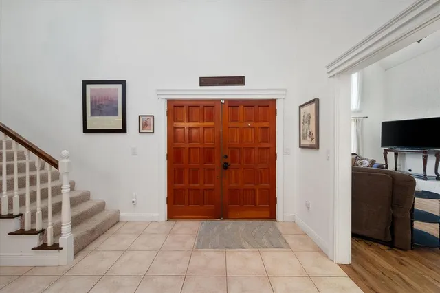 a view of entryway with stairs and furniture