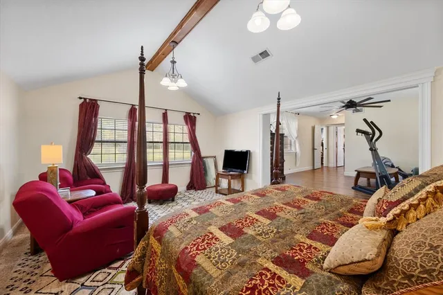 a bathroom with double vanity sinks and a mirror