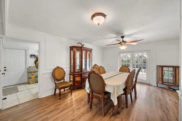 a kitchen with stainless steel appliances white cabinets and a sink
