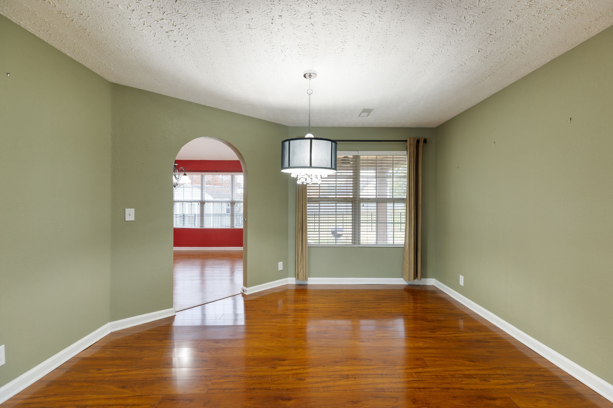 1240 Hunters Point Lane Spring Hill, TN 37174 - Photo 13 of 58 a view of empty room with wooden floor and fan