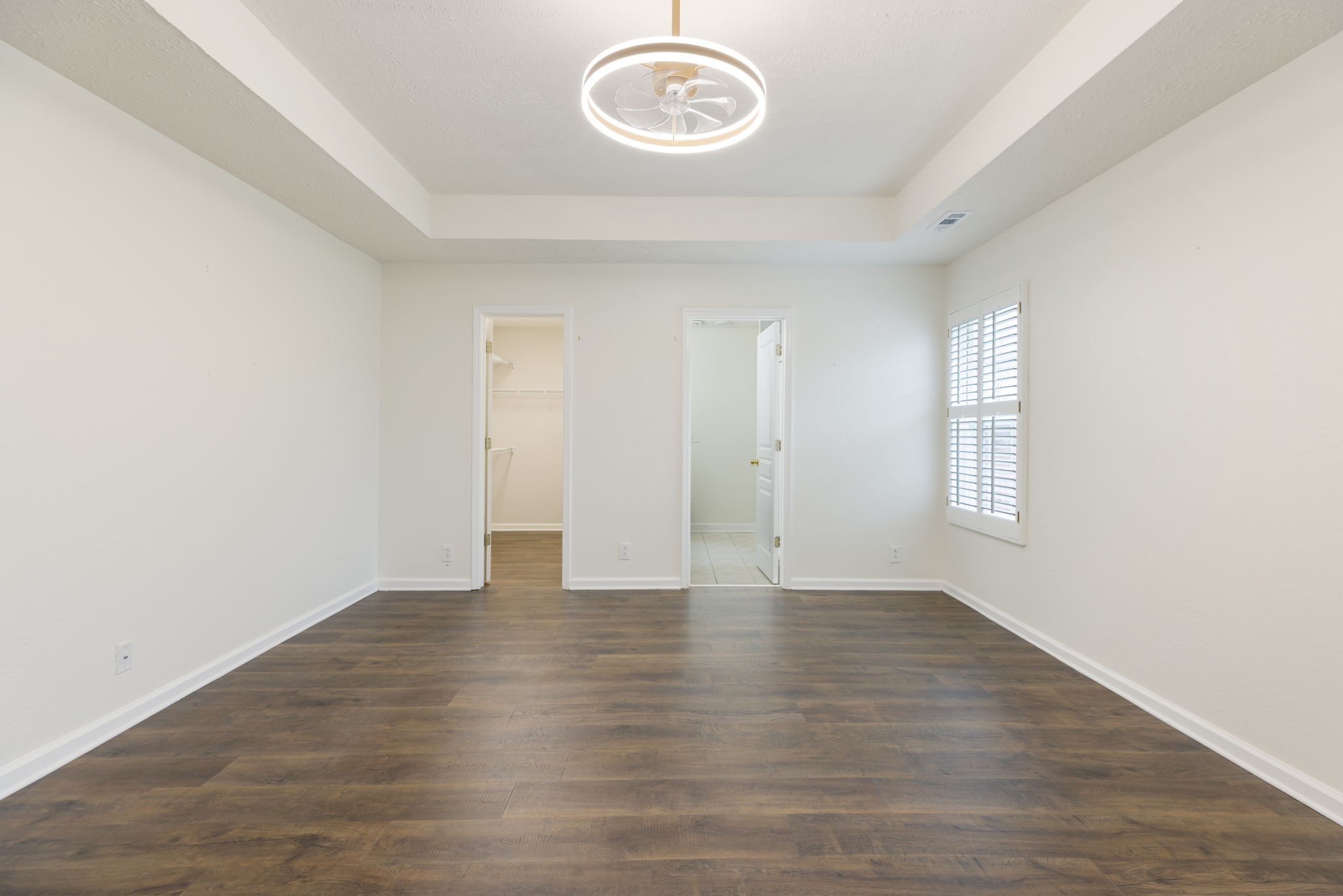 1240 Hunters Point Lane Spring Hill, TN 37174 - Photo 29 of 58 a view of an empty room with a window and wooden floor