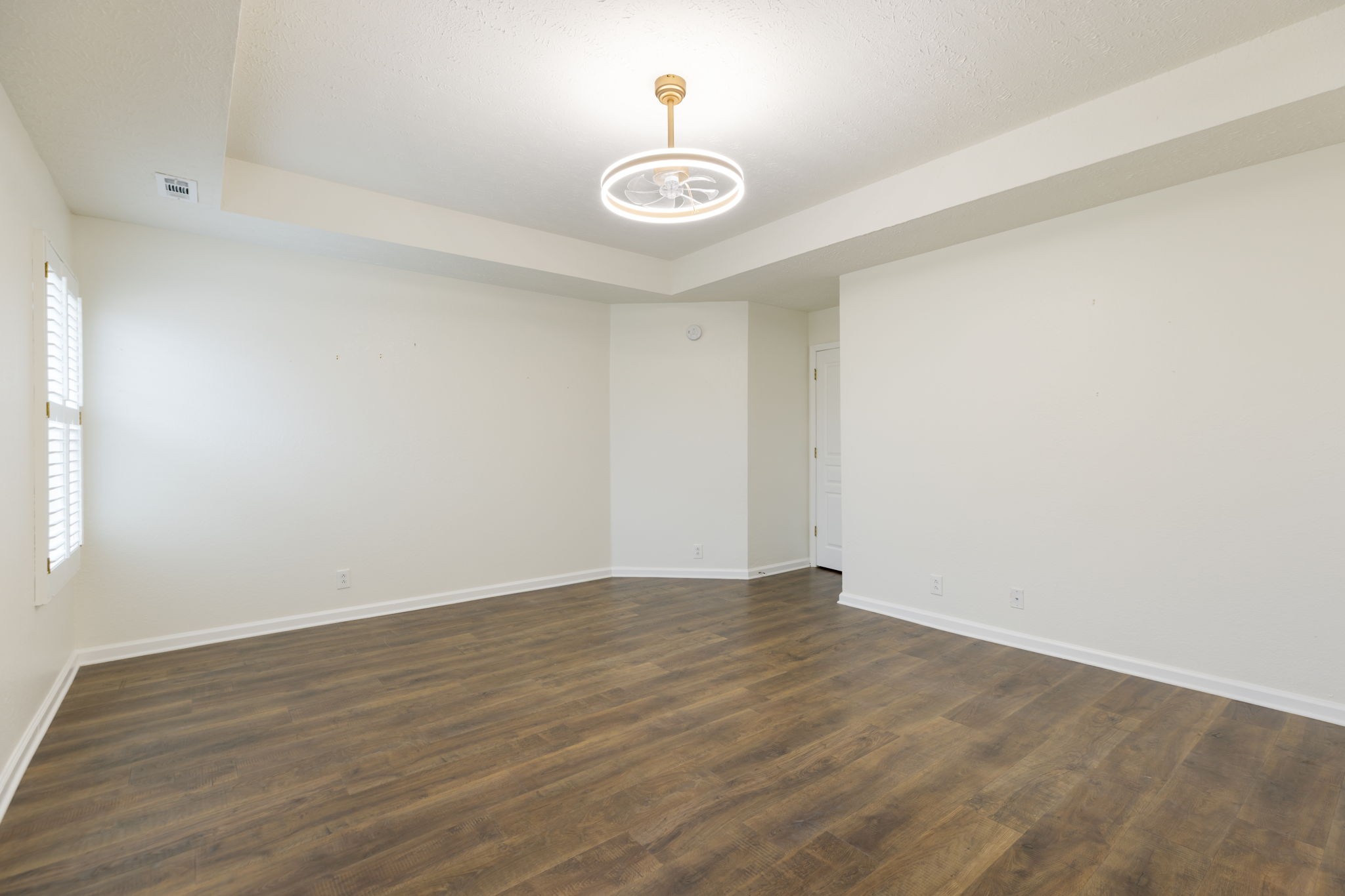 1240 Hunters Point Lane Spring Hill, TN 37174 - Photo 31 of 58 a view of an empty room with a window and a kitchen view