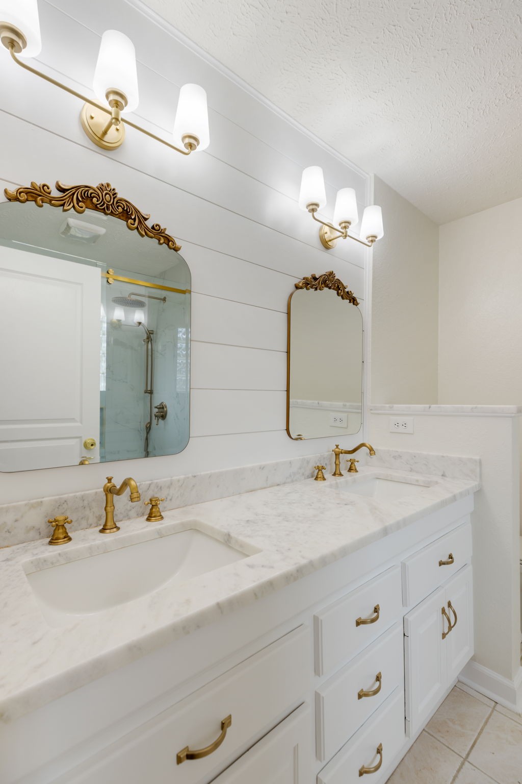 1240 Hunters Point Lane Spring Hill, TN 37174 - Photo 34 of 58 a bathroom with a double vanity sink and a mirror