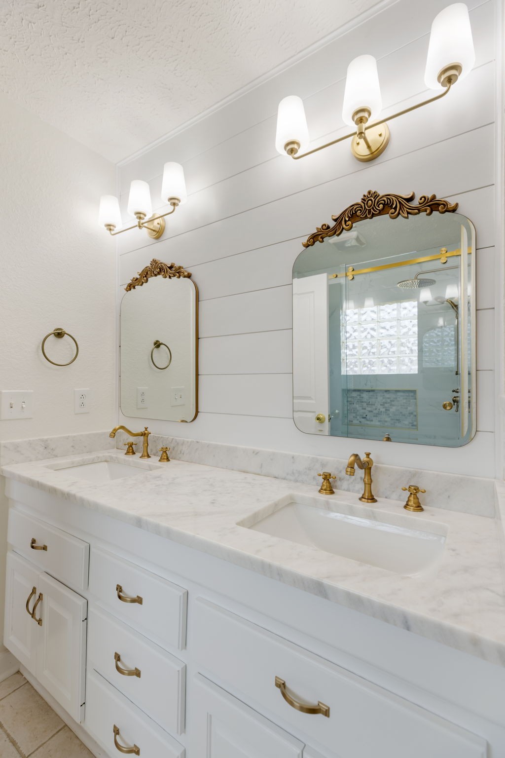 1240 Hunters Point Lane Spring Hill, TN 37174 - Photo 35 of 58 a bathroom with a sink and a mirror