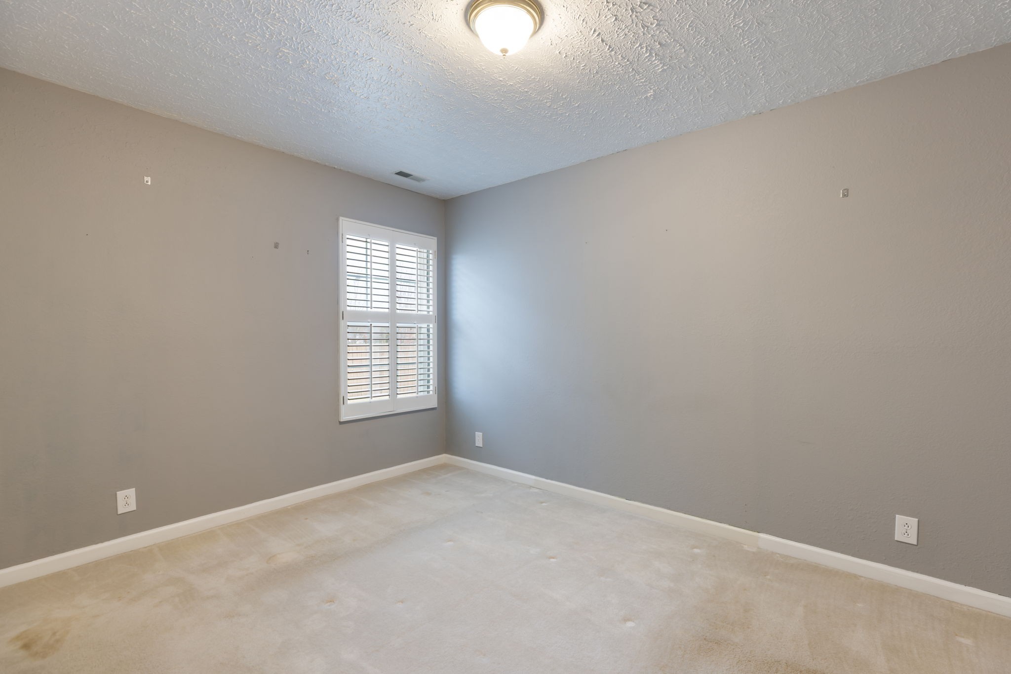 1240 Hunters Point Lane Spring Hill, TN 37174 - Photo 38 of 58 a view of an empty room with a window