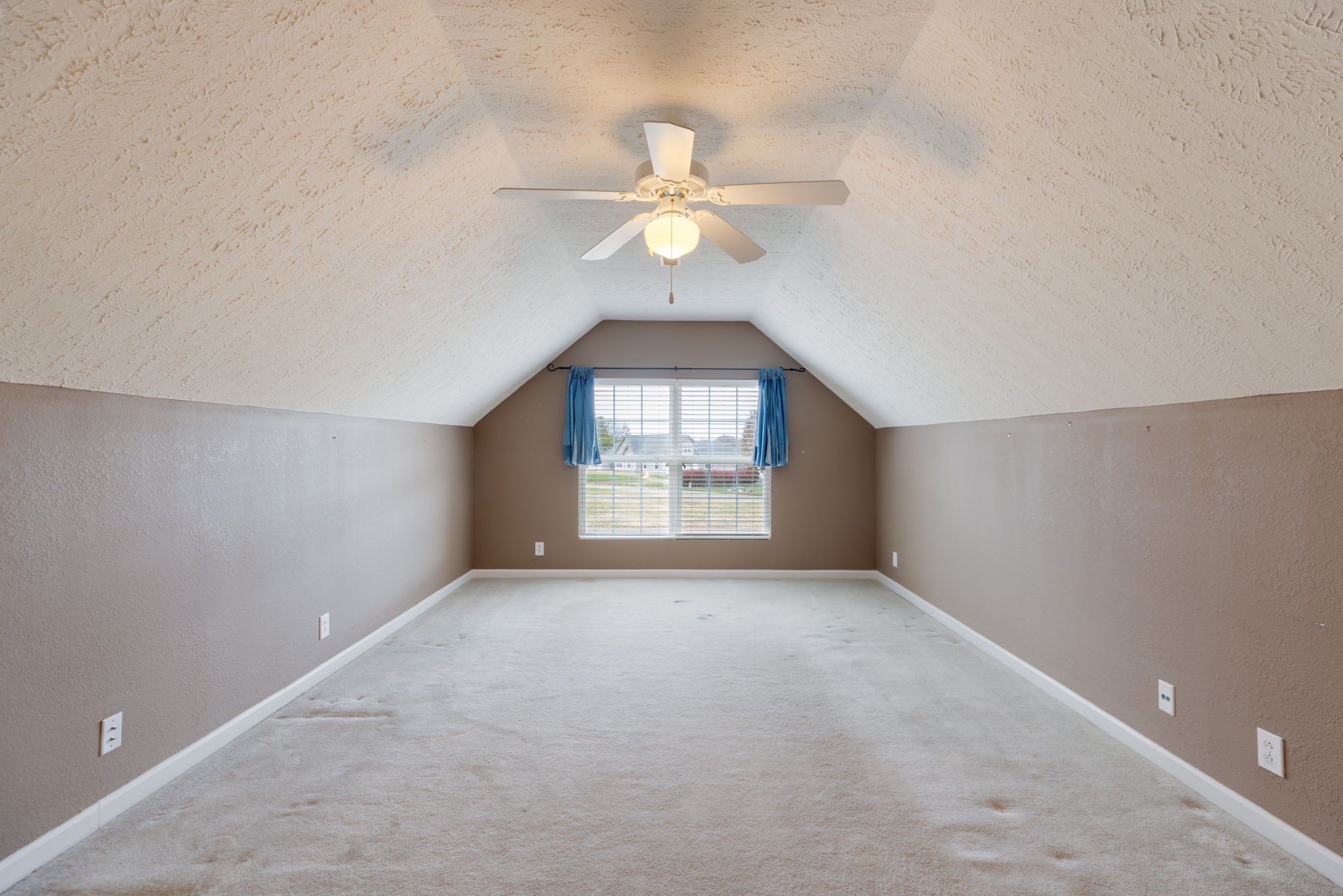 1240 Hunters Point Lane Spring Hill, TN 37174 - Photo 42 of 58 an empty room with a window and a fan