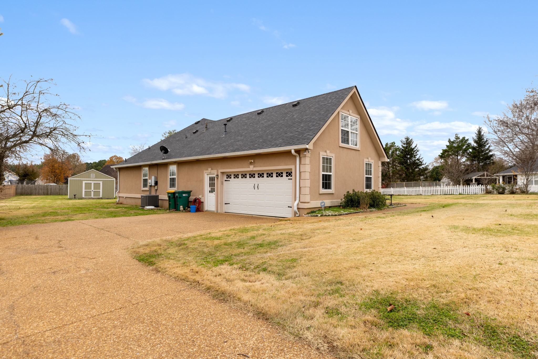 1240 Hunters Point Lane Spring Hill, TN 37174 - Photo 46 of 58 a view of a house with a yard and garage