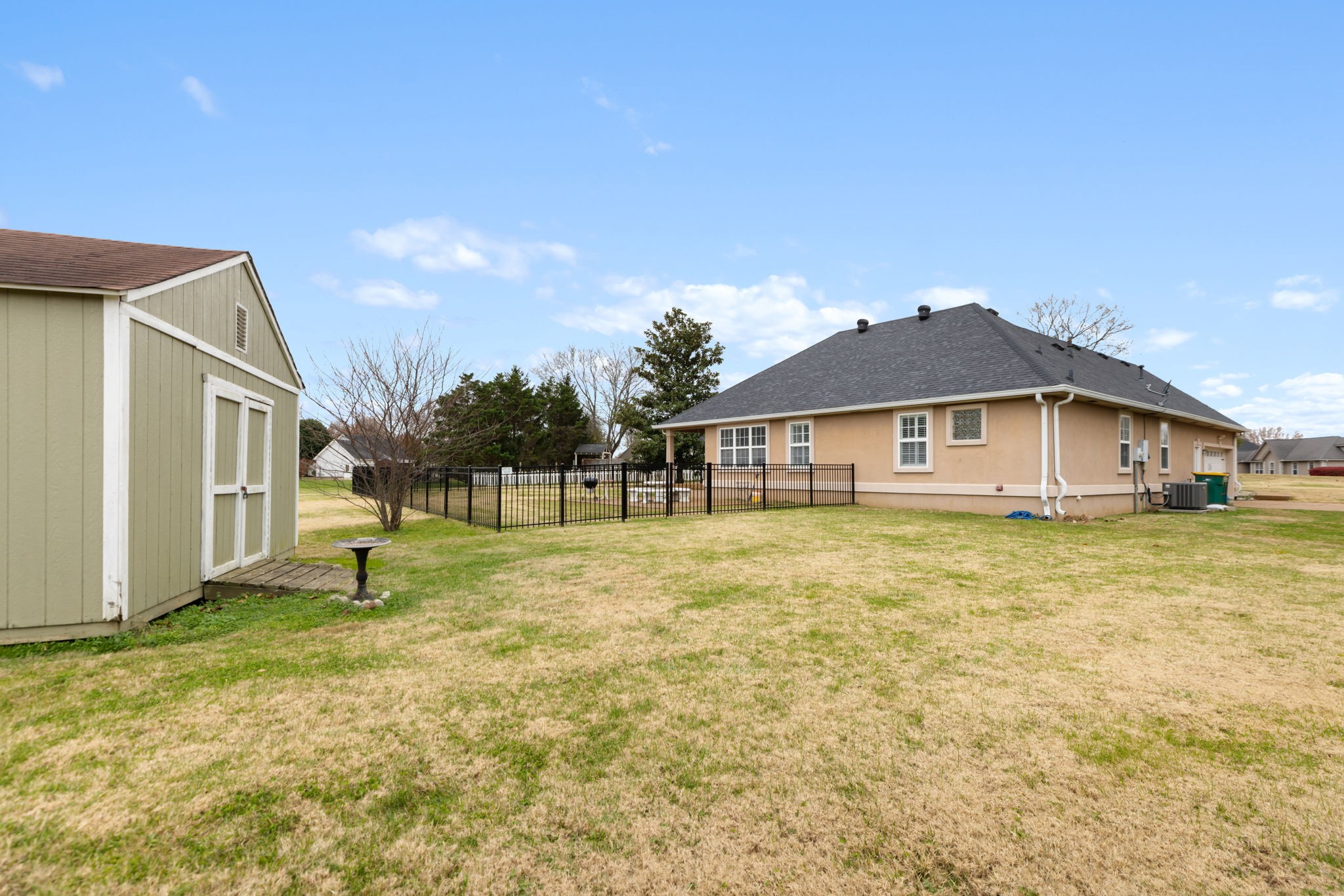 1240 Hunters Point Lane Spring Hill, TN 37174 - Photo 57 of 58 a front view of a house with a yard