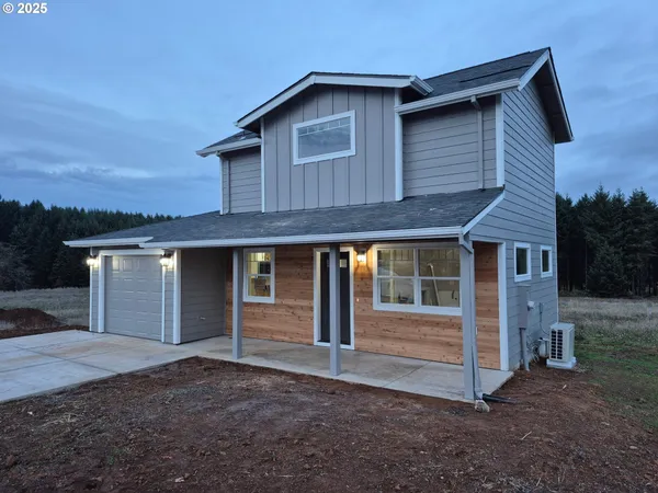 a house view with a backyard space