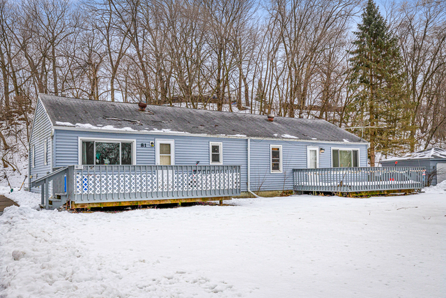 81-83 Eagle Point Road Fox Lake, IL 60020 - Photo 2 of 23 a front view of a house with a yard